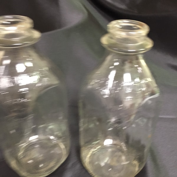 Two Square Embossed Quart Milk Bottles (9") from Gramercy Dairy, NY