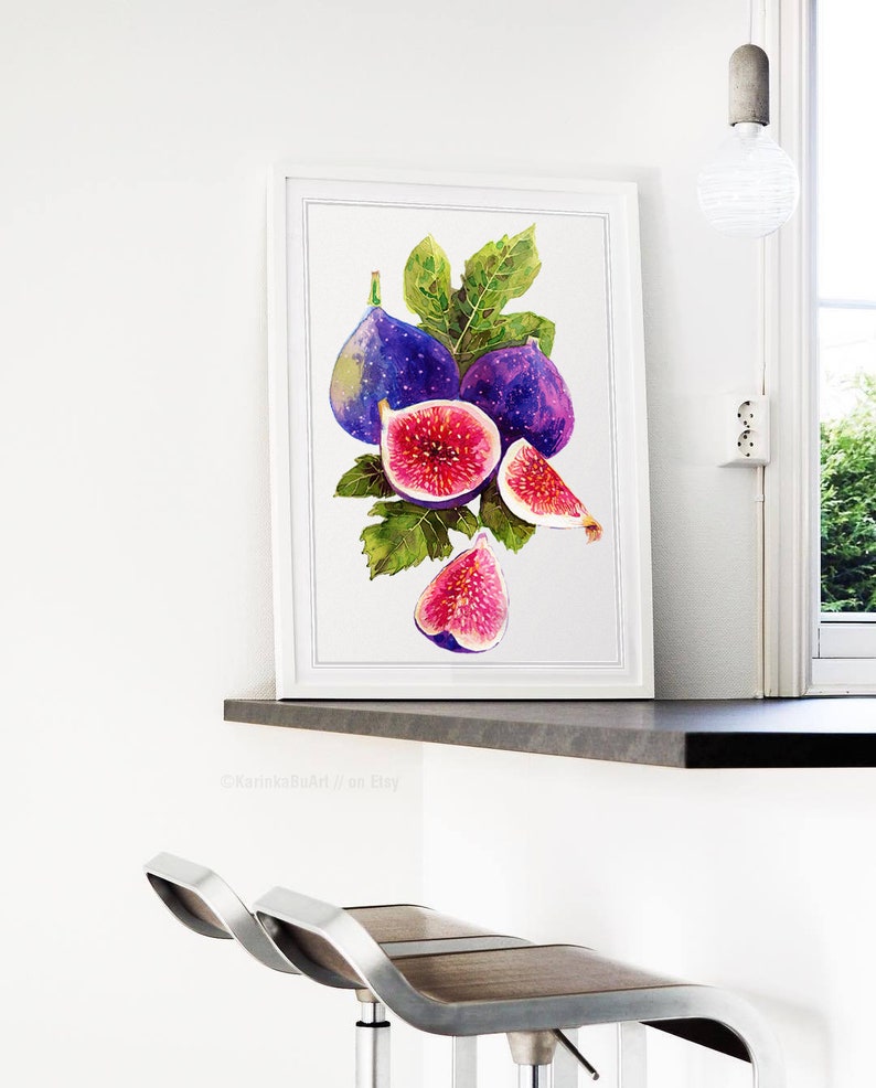 May include: A watercolor painting of figs. The painting features three whole figs and two fig halves, all with a purple exterior and pink interior. The figs are surrounded by green leaves.