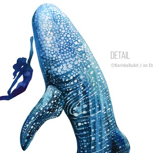 May include: A watercolor painting of a whale shark with a blue and white spotted pattern. A silhouette of a person is swimming towards the whale shark.