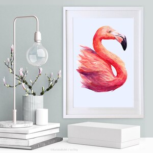 May include: A watercolor painting of a pink flamingo with its head turned to the side. The flamingo is depicted in a graceful pose with its long neck curved and its wings spread out. The painting is set against a white background.