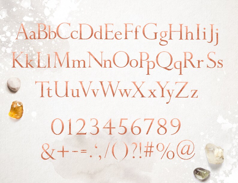 May include: A copper-colored font set with uppercase and lowercase letters, numbers, and symbols. The font is displayed on a white background with a watercolor-like texture.