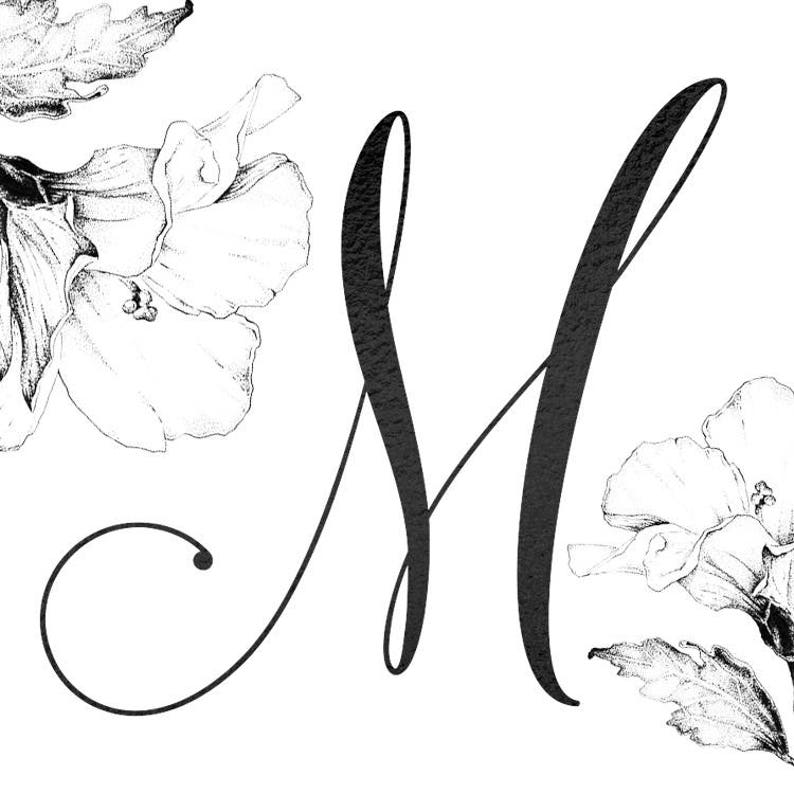 May include: A black and white illustration of the letter "M" with a floral design. The letter is in a cursive font and is surrounded by two hibiscus flowers.