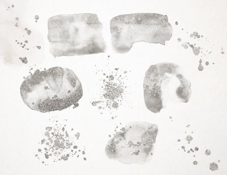 May include: A set of silver watercolor paint splatters and washes on a white background. The splatters are various sizes and shapes, and the washes are irregular and organic.