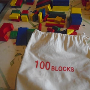 100 Blocks, Early Development blocks, four different colors, red, green, blue, yellow
