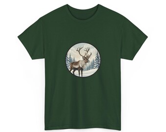 May include: A dark green t-shirt featuring a circular graphic of a reindeer in a snowy forest scene. The reindeer is brown and white with large antlers. The background includes snow-covered ground and evergreen trees.