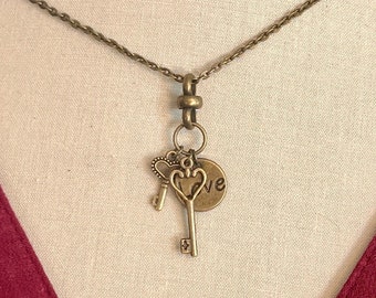 Charm necklace with keys and hearts / short charm necklace / dark gold / bronze