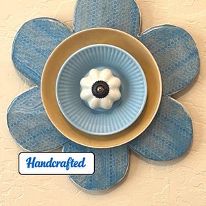 Handcut Wood Flower Wall Decor: Gloss epoxy base.  Blue, Yellow Plates, with Ceramic Knob