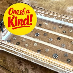 Distressed White Wood Tray: Burlap Ribbon, Buttons under clear Epoxy.  Large Black Metal Handles.
