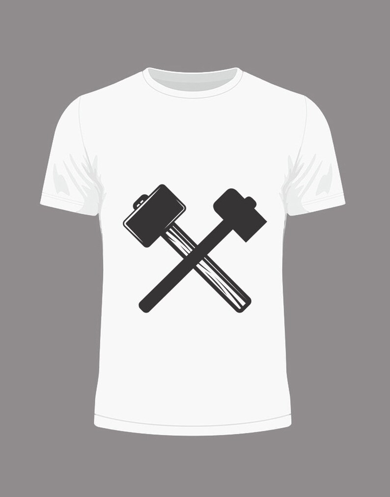 May include: White t-shirt with a black graphic of two crossed hammers.