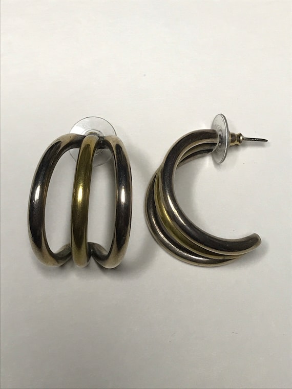 Silver and gold tone metal half moon earrings