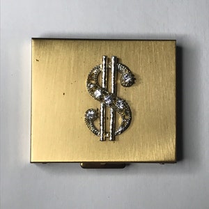 Vintage dollar sign gold metal compact/box/container/pillbox