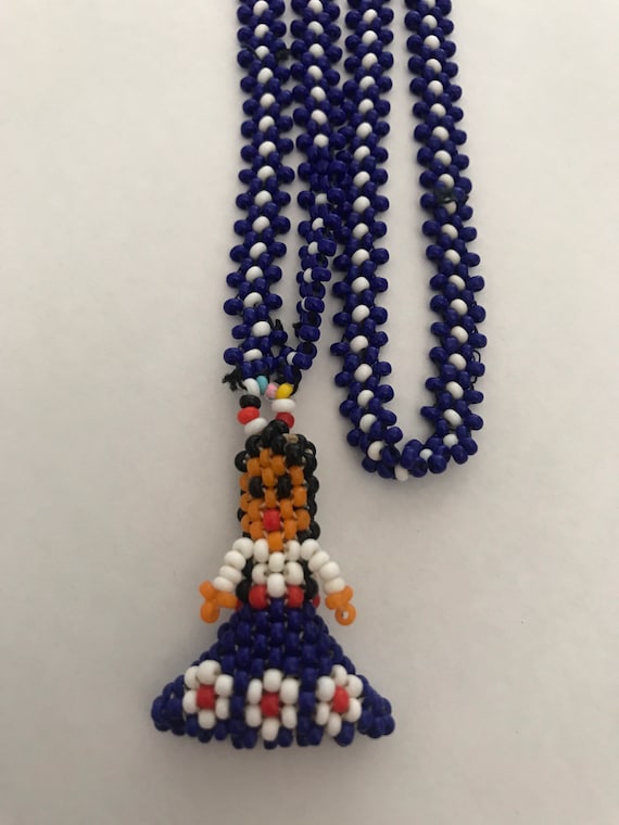 1960s hand beaded hula girl