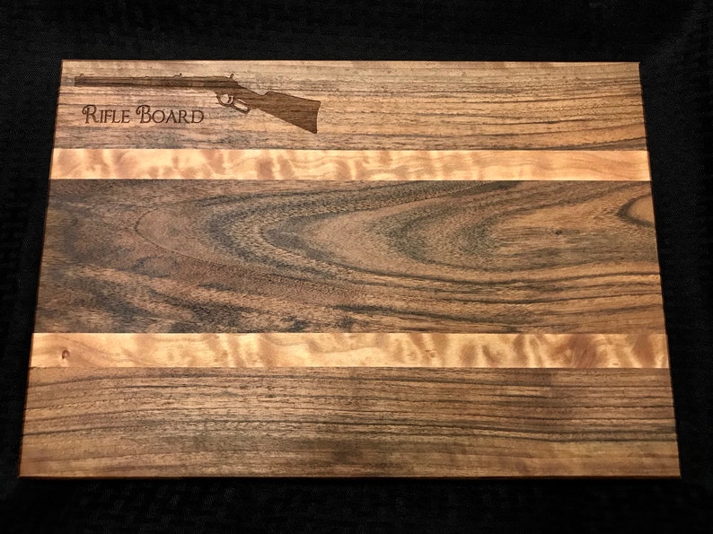 Gorgeous english walnut and quilted maple cutting board.