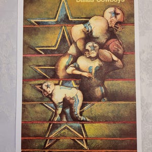 May include: Vintage poster featuring Dallas Cowboys football players in action. The artwork depicts players in blue and white uniforms, set against a backdrop of large blue stars and horizontal brown lines. The words "Dallas Cowboys" are at the top.