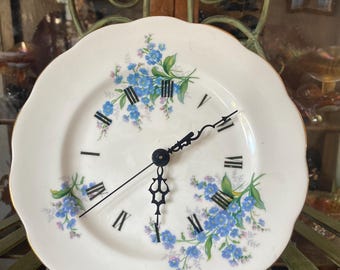 Royal Albert Forget Me Not Clock. 8 inches  diameter.  Produced in England 1950’s.