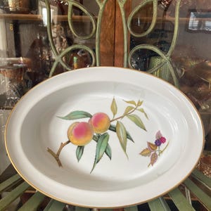 Royal Worcester Evesham Gold Baker. 11 inches wide. Produced in England 1962 to 2015.