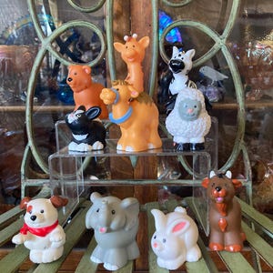 Fisher Price Little People Animals. Set of 10. New Condition. 1.75 to 4 inches tall.