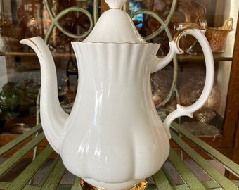 Royal Albert Val D’Or Coffee Pot. 10.5 inches tall. Produced in England 1962 to 2010.