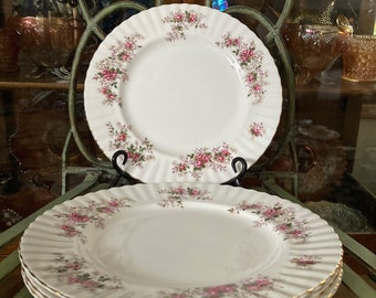 Royal Albert Lavender Rose Dinner Plates. Set of 4. Produced in England 1961 to 2009.  10.25 inches diameter.