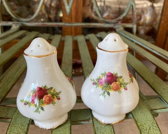 Royal Albert Old Country Roses Salt and Pepper Pair. 3.25 inches tall. Produced in England 1962.