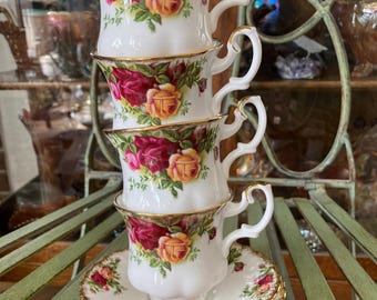 Royal Albert Old Country Roses  Demitasse. Set of 4. Saucers  5 inches diameter . Produced in England 1962.
