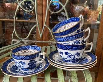 Booths Real Old Willow Blue Cups and Saucers. Set of 4 Saucers 5.75 inches diameter. Produced in England 1910.