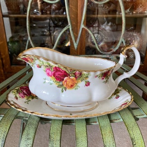 Royal Albert Old Country Roses Gravy Boat and Under Plate. 8 inches wide. Produced in England 1962.