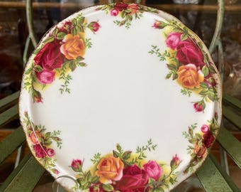 Royal Albert Old Country Roses  Trivet. 6 inches diameter . Produced in England 1962.