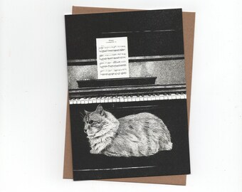 Cat at the piano, folded card with envelope, print of a pen and inkdrawing