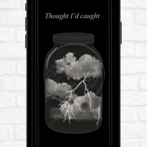 May include: A black and white image of a glass jar with a stormy sky inside. The text "Thought I'd caught" is above the jar.