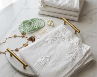 White palazzo pants select designs.