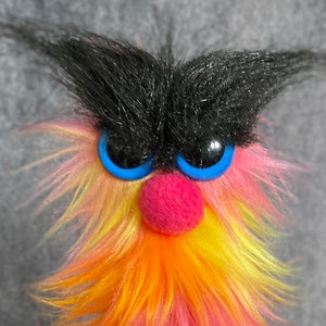 Expanda Monster - Orange, Yellow, Pink, Multi-Colored - A furry growing rod puppet - by Puppet Arts Workshop
