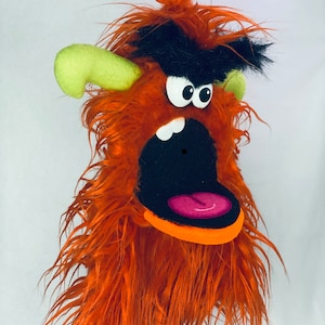 Professional Monster Troll Hand Puppet, Orange & Green: A Furry Hand Puppet With an Expressive Personality by Puppet Arts Workshop.