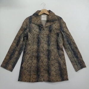 May include: A long-sleeved jacket with a snakeskin pattern in shades of brown and blue. The jacket has a zipper closure and a collared neckline. The garment is hanging on a wooden hanger against a white background.