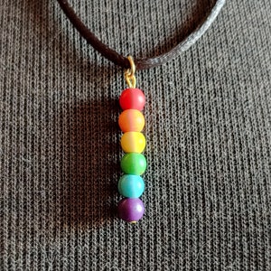 Rainbow Pride Pendant Necklace- Stone beads, adjustable satin cord with nickel-free gold findings. 50% of profits will go to Trevor Project