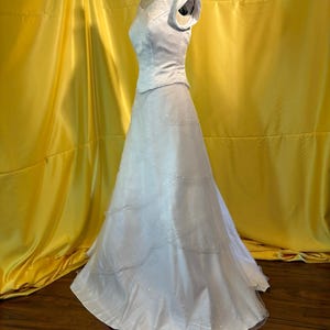 sachin and babi light blue dress Explore Modest Temple Ready Wedding Dresses at Bridal Closet main image 1