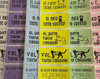 May include: A set of colorful stickers with a cat illustration and the text "El Gato Tiene Correo!" in Spanish, which translates to "The Cat Has Mail!"