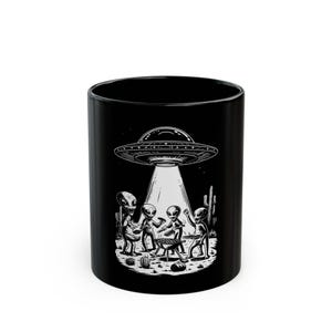 May include: A set of three ceramic mugs with a speckled, matte finish. The mugs are in shades of cream, light gray, and dark gray. Each mug has a simple, minimalist design, perfect for coffee or tea.