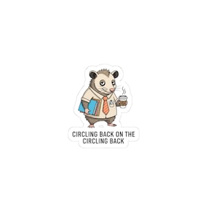 May include: A sticker featuring an opossum dressed in a collared shirt and tie, holding books and a coffee cup. The text "CIRCLING BACK ON THE CIRCLING BACK" is below the opossum.