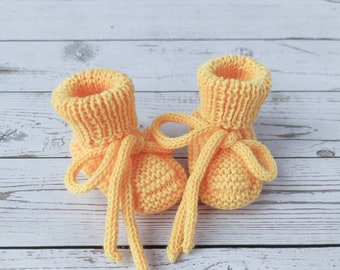 Yellow baby booties merino wool knitted, newborn baby slippers