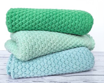 Green baby blanket knitted of soft merino wool, heirloom blanket for baby boy or baby girl