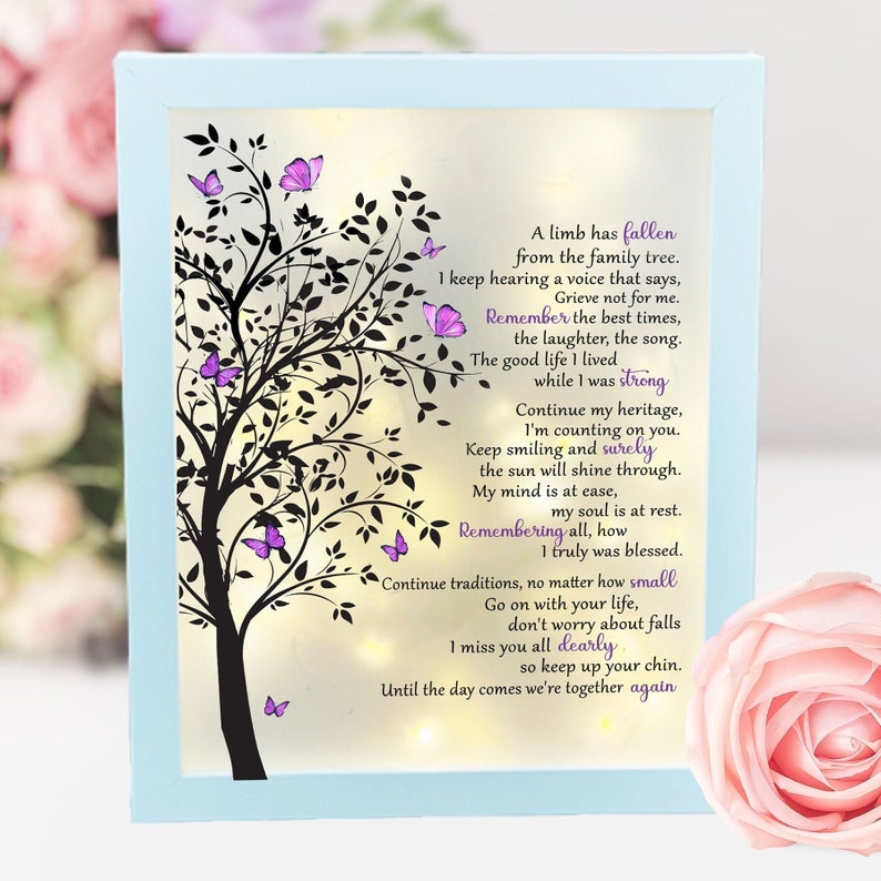 A lighted shadow box featuring a heartfelt memorial quote, elegantly illuminated. The design is available in three color options, creating a warm and thoughtful tribute.