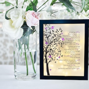 A lighted shadow box featuring a heartfelt memorial quote, elegantly illuminated. The design is available in three color options, creating a warm and thoughtful tribute.
