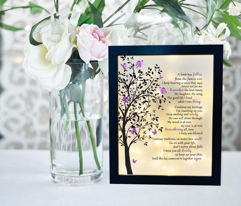 A lighted shadow box featuring a heartfelt memorial quote, elegantly illuminated. The design is available in three color options, creating a warm and thoughtful tribute.