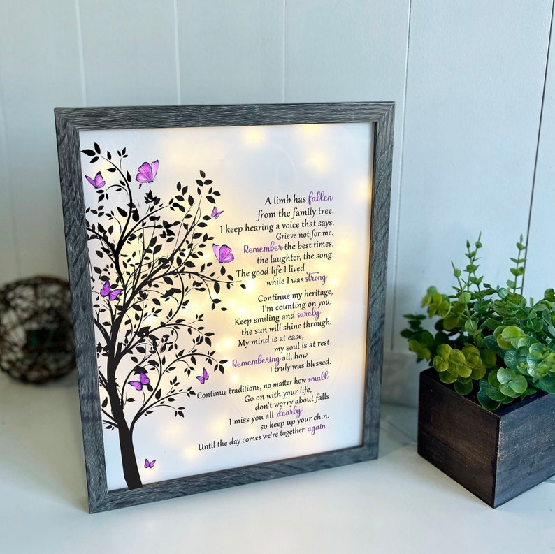 A lighted shadow box featuring a heartfelt memorial quote, elegantly illuminated. The design is available in three color options, creating a warm and thoughtful tribute.