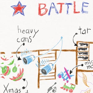 May include: A hand-drawn illustration of a battle scene with a red star, the word "BATTLE" in red and blue, and two blue cans labeled "heavy cans" being launched from a wooden structure. The scene also includes a wooden ladder, a toy truck, a toy train, and a Christmas ornament.