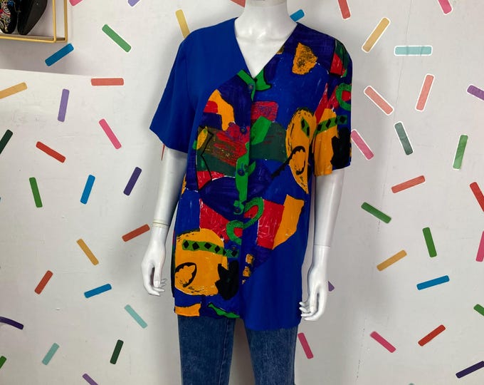 Vintage short sleeve bright blue abstract design top size 16