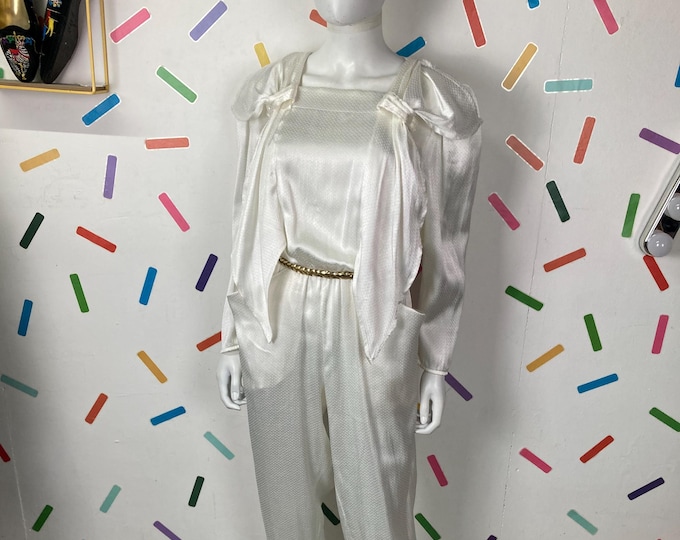 1980s cream shoulder detail textured  jumpsuit size 10-14