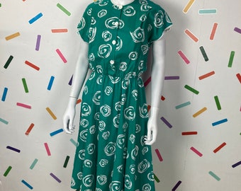 1980s does 50s true vintage green swirl deign mid dress with button fastening - Size up to 14