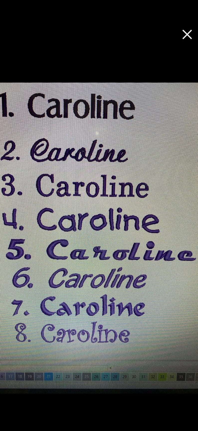 May include: A close-up of a screen showing the name "Caroline" written eight times in different fonts. The numbers 1 through 8 are listed next to each name.